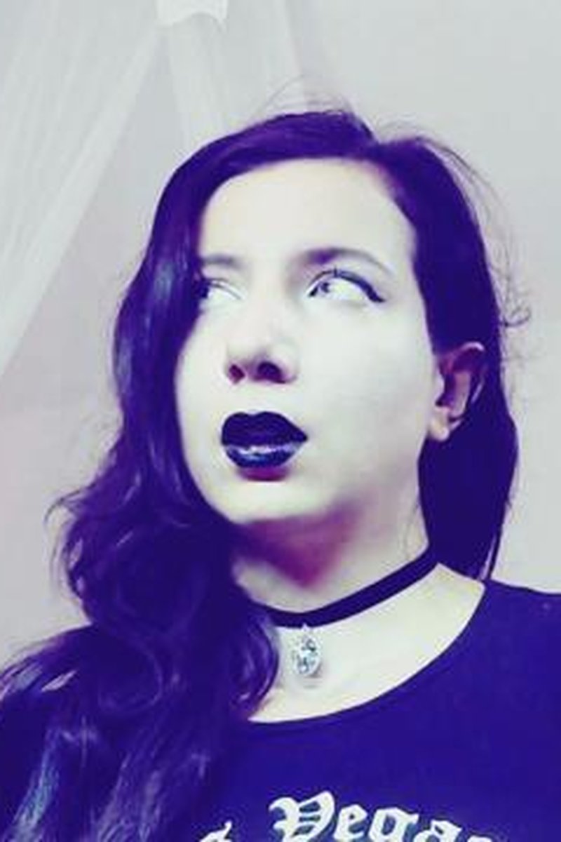 Goth Chick Eats Tiny Man - Screenshot 1 of 4 - Alternative Girl