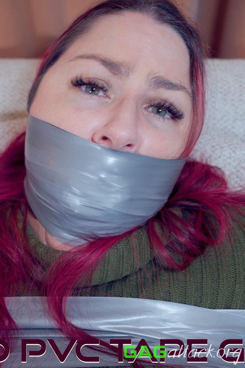 Captive Lacey's Layered PVC Tape Gag Predicament - Screenshot 1 of 4 - Bondage