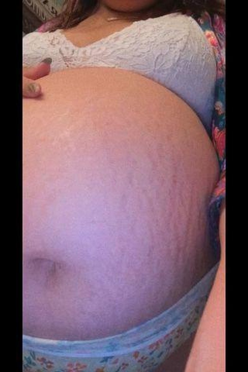 Oiling Belly Expansion - Screenshot 1 of 4 - Belly Fetish