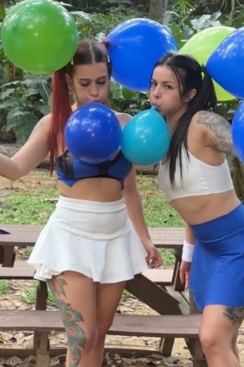 With Katty Blake Blowing Up Balloons In The Park - Screenshot 1 of 4 - Balloon Fetish