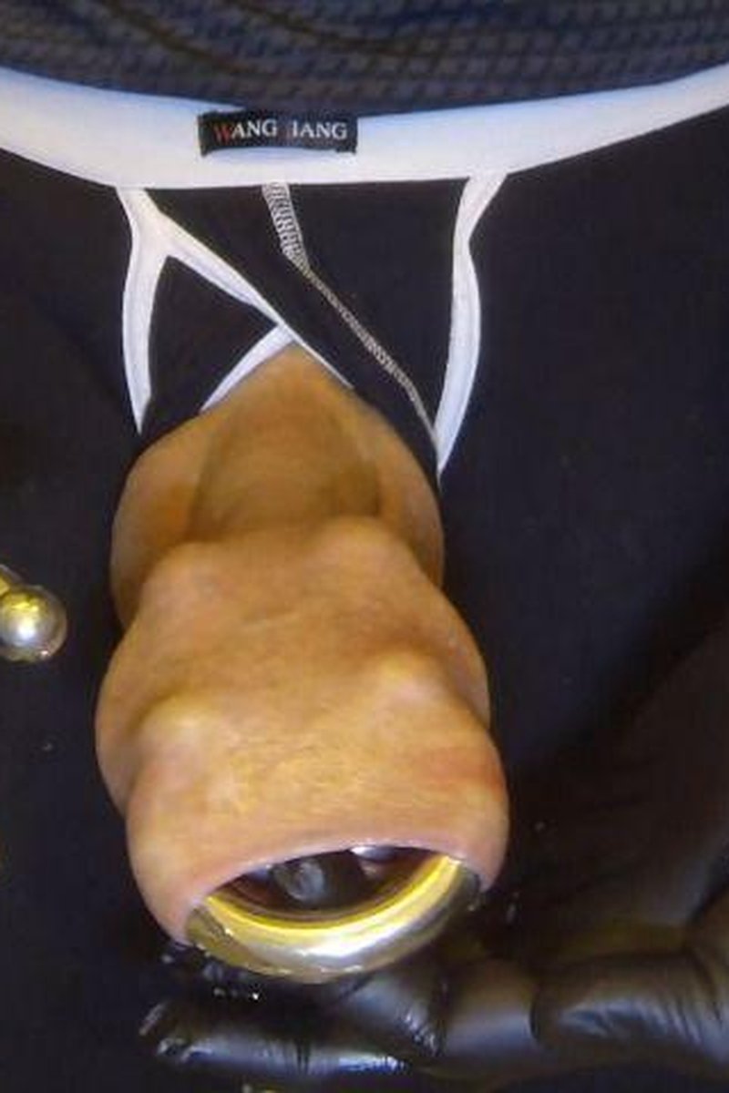 Insertion Of Shoe-Shaped Piercings - Screenshot 1 of 4 - Fetish