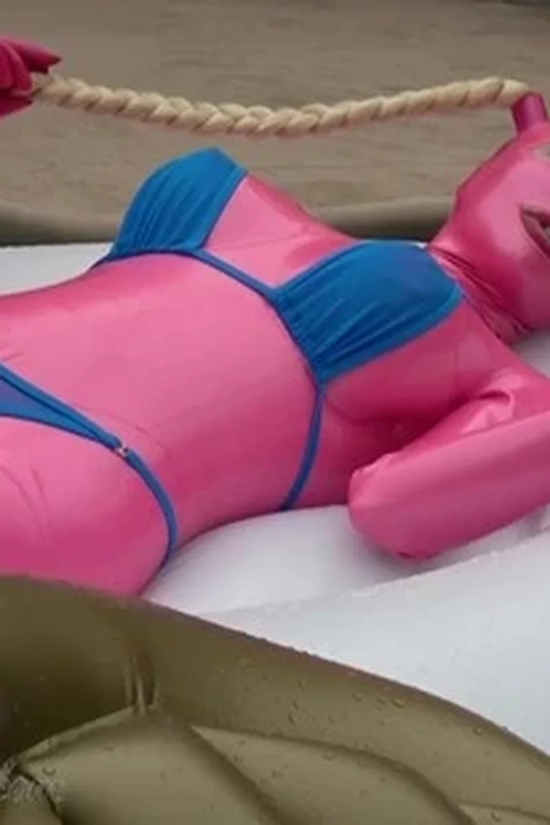 The Big Boob Rubberdoll Horny on the Pegasus Pool Float - Screenshot 1 of 4 - Latex