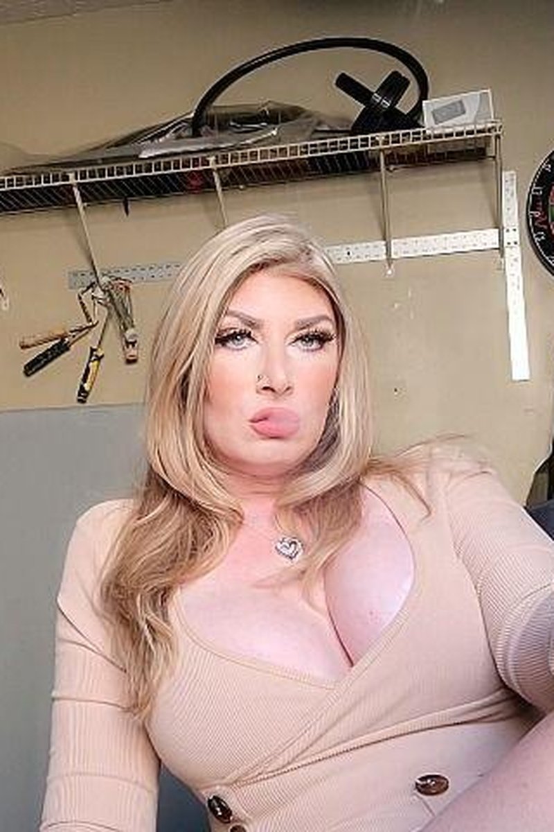 Sexy Blonde Smoker, Low Cut Blouse - Screenshot 1 of 4 - Big Tits