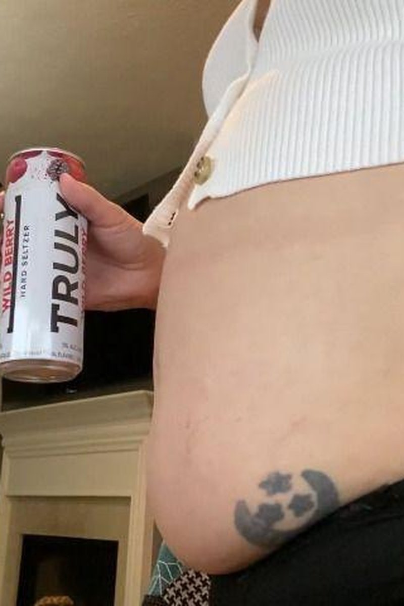 Bloating In Button Sweater - Screenshot 1 of 4 - Belly Fetish
