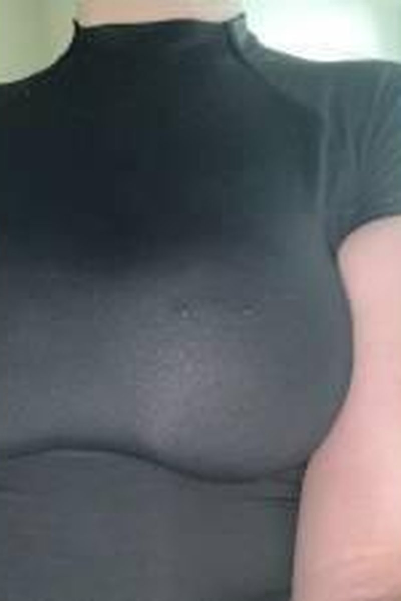 Getting Dressed Tease - Screenshot 1 of 4 - Bra