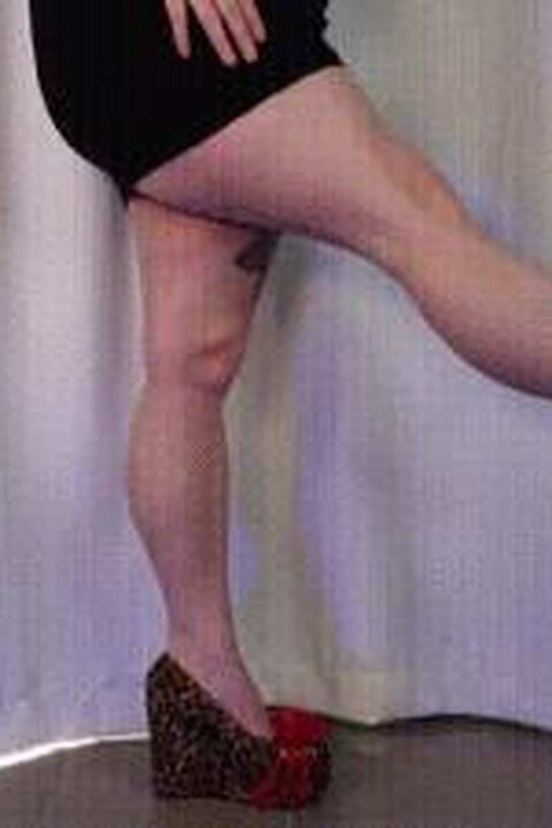 Calf Muscle Flex In Leopard Wedge Heels With Flower - Screenshot 1 of 4 - Calf Muscle Fetish