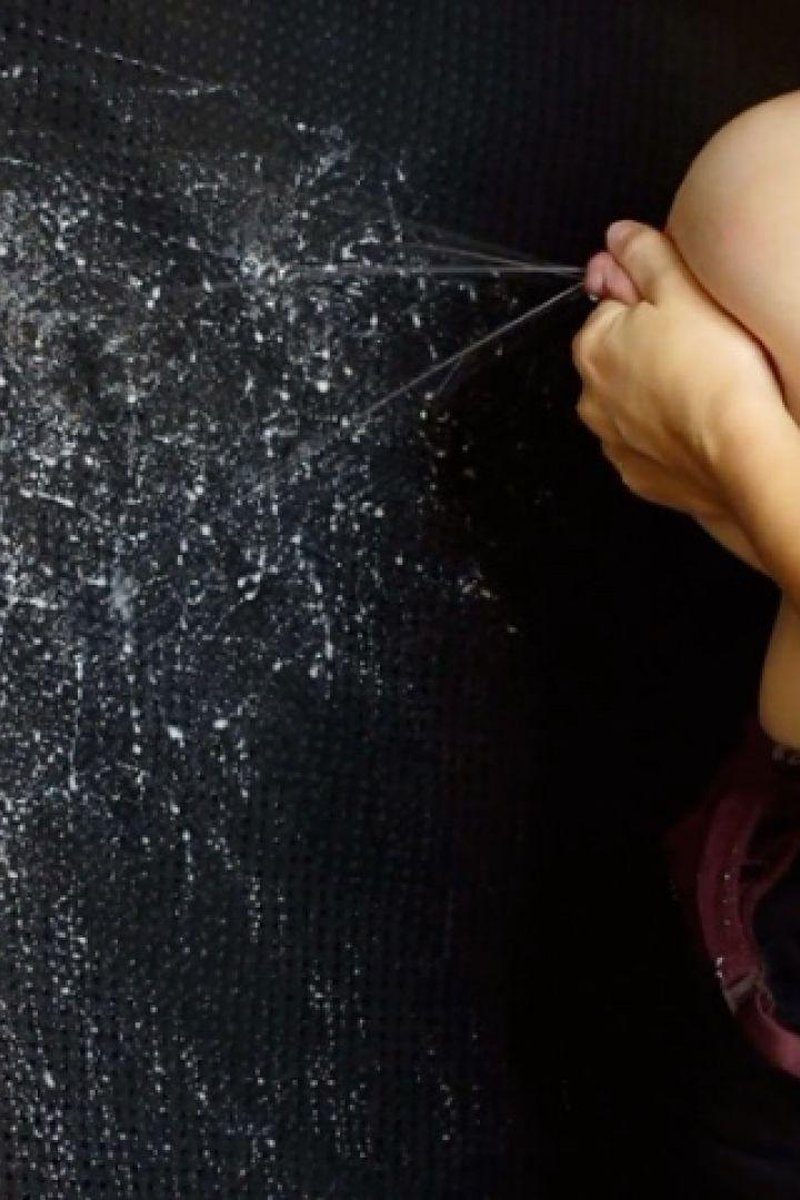 Spraying Breastmilk Onto A Black Curtain - Screenshot 1 of 4 - Hand Expressing