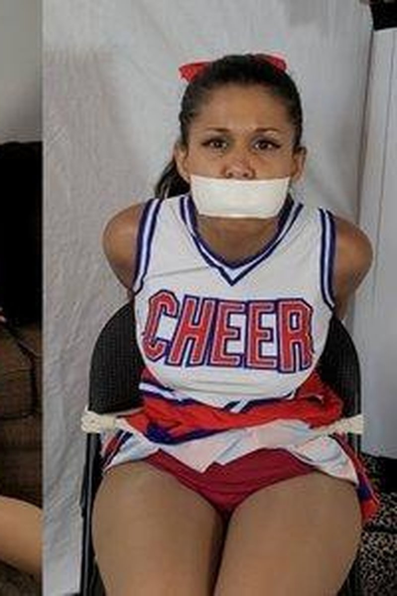 Cheerleader Calisa Has A Gagged Filled Day - Screenshot 1 of 4 - Black