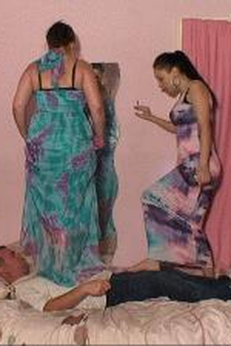 2 Girls Hard Trample Stomp & Jump On The Slave On The Bed - Screenshot 1 of 4 - Foot Torment