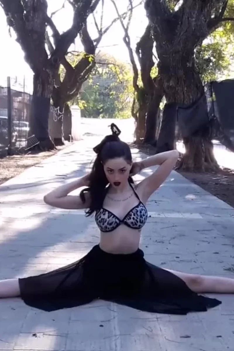 Flexible Girl in Street with Long Legs - Screenshot 1 of 4 - Flexible