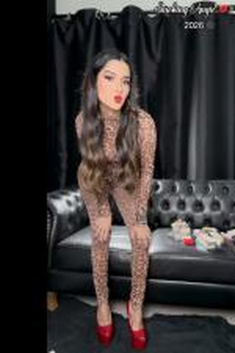 Leopard Sheer Jumpsuit, Red Pole High Heels And Cigarette Holder! - Screenshot 1 of 4 - Big Ass