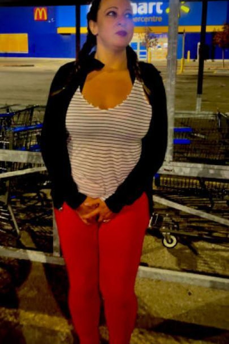 Desperate MILF Pees In Supercenter Parking Lot - Screenshot 1 of 4 - Close Up