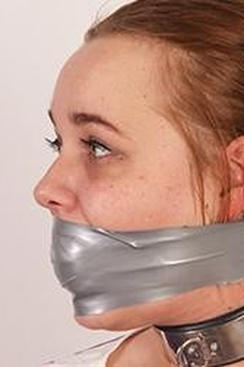 Tape Gagged and Stuffed with Socks - Screenshot 1 of 4