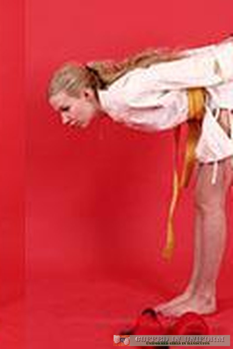 Young Martial Arts Talent In Cuffs - Screenshot 1 of 4 - Bondage