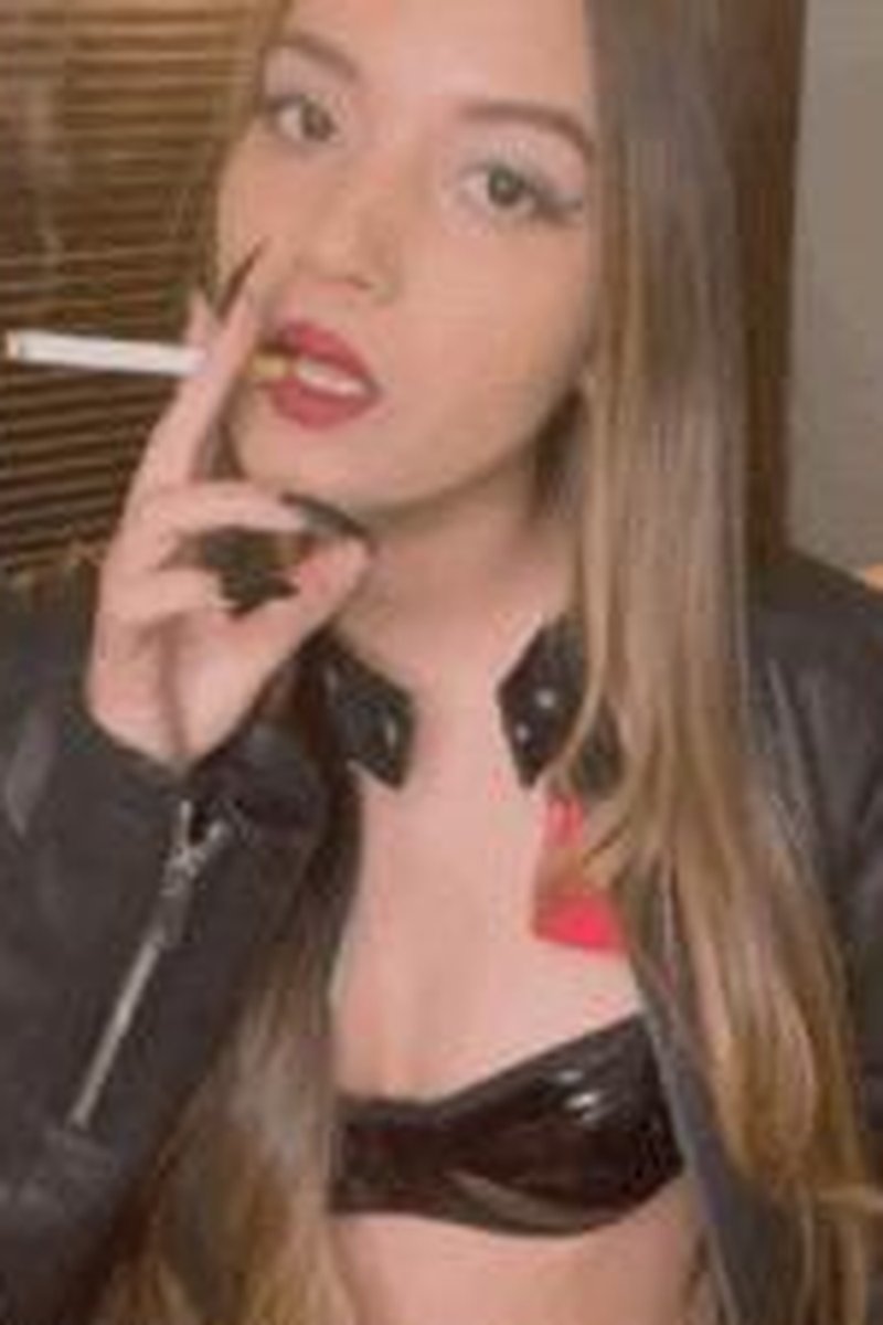 Double Pumps In A Marlboro Red- Leather Bra & Leather Jacket - Screenshot 1 of 4 - Bra